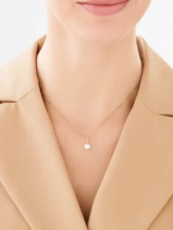 Złota zawieszka z perłą