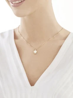 Złota zawieszka z perłą i cyrkonią