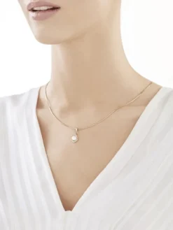 Złota zawieszka z perłą i cyrkoniami