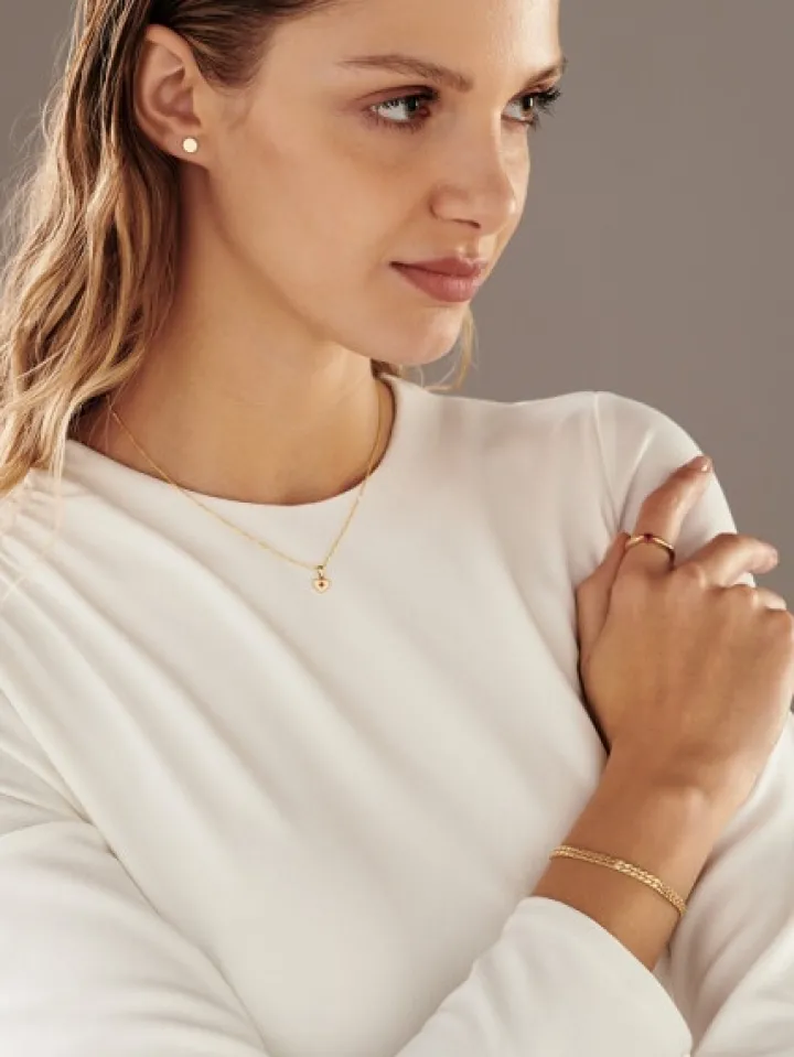 Złota zawieszka z rubinem syntetycznym - serce