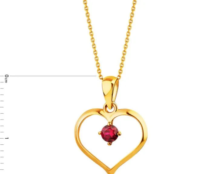 Złota zawieszka z rubinem syntetycznym - serce