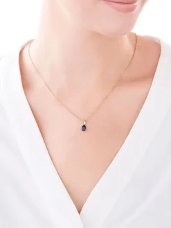 Złota zawieszka z szafirem syntetycznym