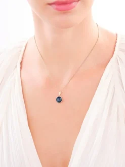 Złota zawieszka z topazem