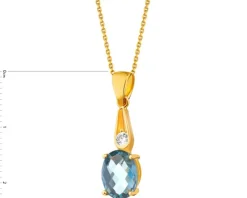 Złota zawieszka z topazem syntetycznym  i cyrkonią