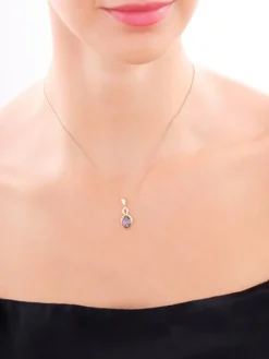 Złota zawieszka z topazem syntetycznym