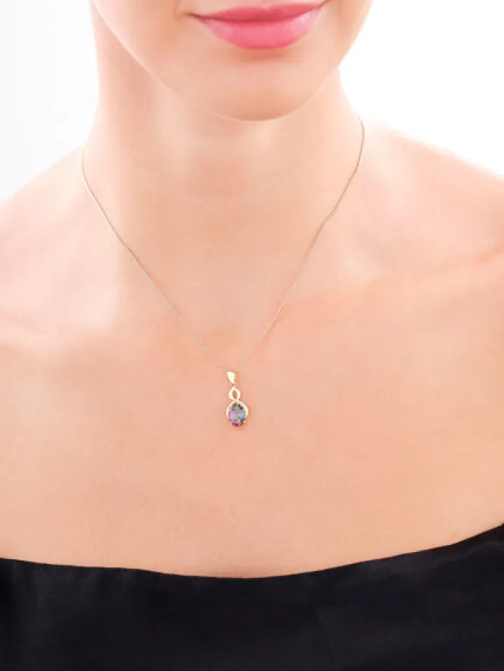 Złota zawieszka z topazem syntetycznym