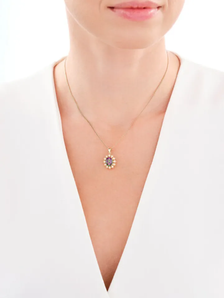 Złota zawieszka z topazem syntetycznym i cyrkoniami