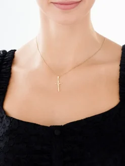 Złota zawieszka z wizerunkiem Chrystusa - krzyż