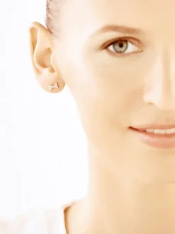 Złote kolczyki - kokardki