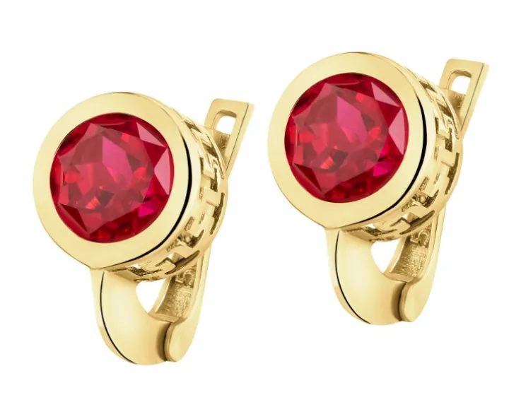 Złote kolczyki z korundami syntetycznymi