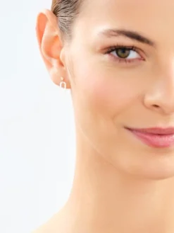 Złote kolczyki z masą perłową