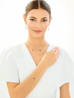 Złote kolczyki z onyksami syntetycznymi - gwiazdy