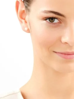 Złote kolczyki z perłami