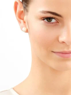 Złote kolczyki z perłami