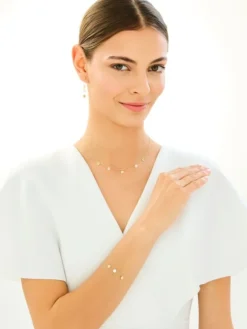 Złoty naszyjnik z masą perłową - koła