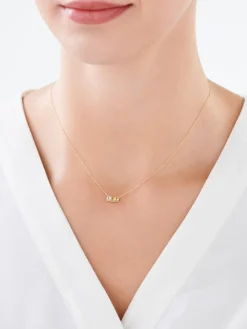 Złoty naszyjnik z topazem syntetycznym i ametystami syntetycznymi