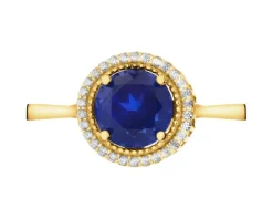 Złoty pierścionek z korundem syntetycznym i cyrkoniami