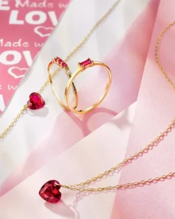 Złoty pierścionek z rubinami syntetycznymi i cyrkoniami