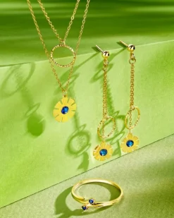 Złoty pierścionek z szafirami syntetycznymi